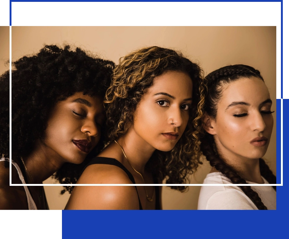 a group of women with curly hair