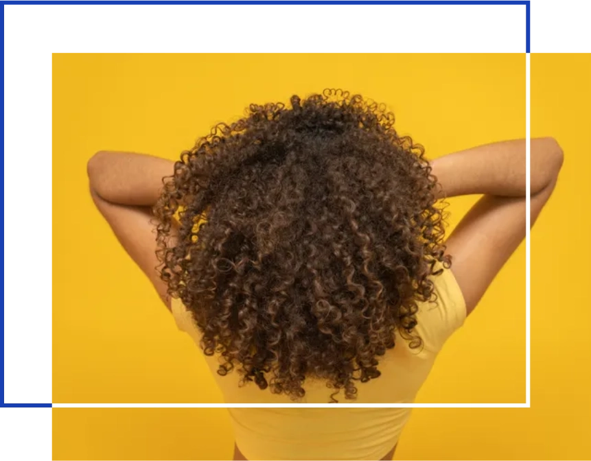 a woman with curly hair